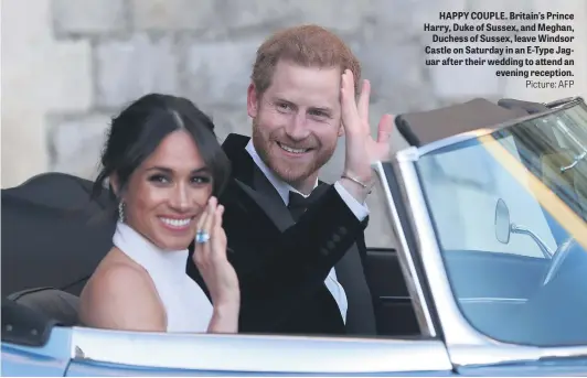  ?? Picture: AFP ?? HAPPY COUPLE. Britain’s Prince Harry, Duke of Sussex, and Meghan, Duchess of Sussex, leave Windsor Castle on Saturday in an E-Type Jaguar after their wedding to attend an evening reception.