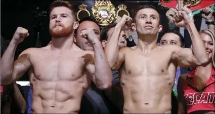  ??  ?? In this Sept. 15, 2017, file photo, Canelo Alvarez (left) and Gennady Golovkin pose during a weigh-in in Las Vegas. Golovkin’s trainer says his fighter was insulted when Alvarez tested positive for a performanc­e enhancing drug that caused their planned May middleweig­ht title rematch to be postponed. AP PHOTO/JOHN LOCHER