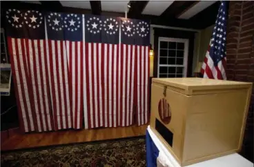  ?? JIM COLE — THE ASSOCIATED PRESS ?? In this file photo, a ballot box is set for residents to vote at in Dixville Notch, N.H.