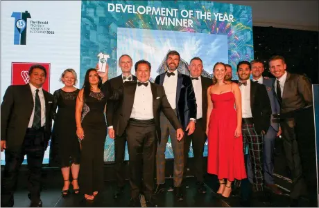  ?? ?? Above, winners of the Developmen­t of the Year category at The Herald Property Awards for Scotland 2022 celebrate at the Doubletree by Hilton. Below, hosts Jennifer Reoch and
Des Clarke