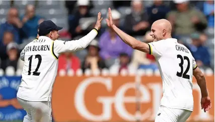  ?? ?? Gloucester­shire loan signing Zak Chappell celebrates his dismissal of Matt Renshaw with Graeme van Buuren