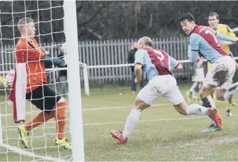  ??  ?? Gavin Cogdon heads in South Shields’ second goal on Saturday