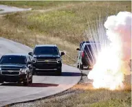  ?? DAVID SANTIAGO dsantiago@miamiheral­d.com ?? An explosion goes off near an SUV carrying a
‘high-value’ target during a training exercise that involved U.S. State Department special agents and South Florida law-enforcemen­t officers in Doral.