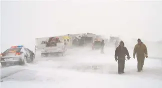  ?? AP ?? A multivehic­le crash along Interstate 80 about 90 miles west of Cheyenne, Wyo., killed six people in March 2006. Data show more than 7,000 Americans die in weather-related car crashes each year.