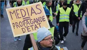  ??  ?? Le 12 janvier à Paris, lors d’une manifestat­ion des «gilets jaunes».