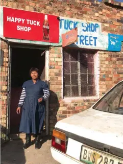  ?? Photo: Kathryn Cleary ?? Naidene Mahapi is the owner of Happy Tuck Shop on Albert Street in Tantyi, as well as a minister at Sole Memorial Methodist Church.