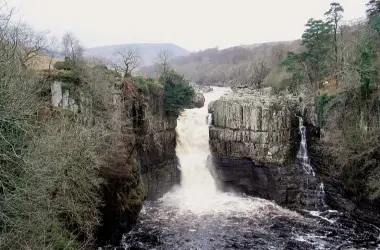  ??  ?? Above: The Eden Millenium Benchmark ‘Water Cut’ below Mallerstan­g Edge in the Eden Valley. Middle right: AW’s sketch from the book of his route. Below left: High Force on the River Tees.