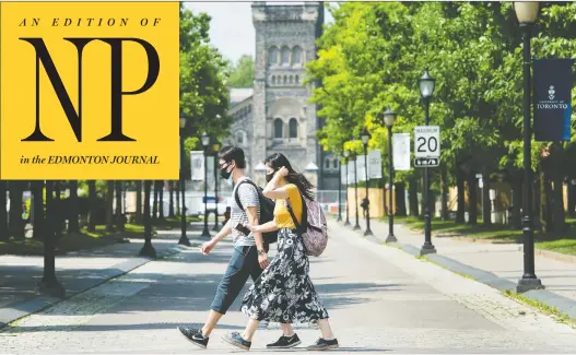  ?? NATHAN DENETTE/THE CANADIAN PRESS ?? People walk past the University of Toronto in June. With the recent surge in COVID-19 cases among young people, many are wondering what the return to campus will be like.