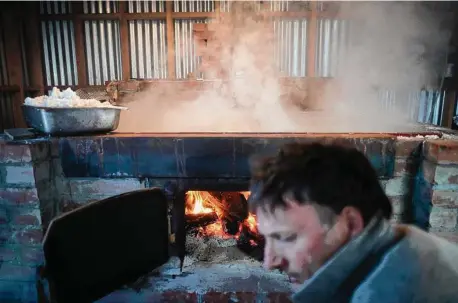  ?? Photos by Brian L. Frank/Special to The Chronicle ?? Jeff Warrin harvests sea salt from ocean water using an oven he built at Hog Island Oyster Co., overlookin­g Tomales Bay.