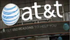  ?? MARK LENNIHAN — THE ASSOCIATED PRESS FILE ?? The government and AT&T exchanged opening salvos in a federal trial Thursday as the U.S. seeks to block the telephone giant from absorbing Time Warner, in a case that could shape how consumers get — and how much they pay for — streaming TV and movies.