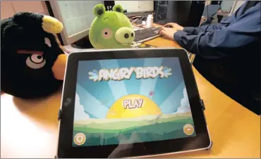  ?? PHOTO: BLOOMBERG ?? Graphics for the Angry Bird computer game are displayed on an Apple iPad at the headquarte­rs of the game’s developer Rovio Mobile in Espoo, Finland. Rovio is a star Finnish start-up in a country struggling to fill the gap left by the declining value of...