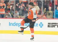  ?? MITCHELL LEFF/GETTY ?? The Flyers’ Scott Laughton reacts after scoring a goal against the Seattle Kraken in the first period on Feb. 10 at the Wells Fargo Center in Philadelph­ia.