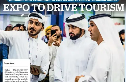  ?? Photo by Neeraj Murali ?? Sheikh Ahmed is being briefed by issam kazim at the Arabian Travel Market in Dubai on Sunday. Helal Saeed Al Marri, CEo of Dubai world Trade Centre, was also present. —