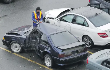  ?? NICK PROCAYLO/FILES ?? A 203-page report by the firm Ernst & Young says B.C.’s auto insurance system faces “unpreceden­ted challenges.”