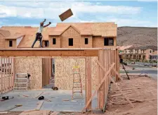  ?? ?? Constructi­on continues on a home in St. George, Utah, on Sept. 27. The area is among the nation’s fastest-growing.