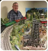  ??  ?? Len is quick to thank his wife and children for encouragin­g him to design and build a large O gauge railroad that helped him remember the Reading Co. from his youth.