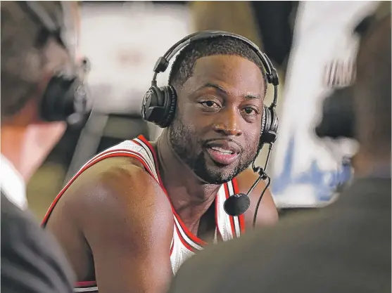  ?? | CHARLES REX ARBOGAST/ AP ?? New Bull DwyaneWade, whose cousin was killed in a shooting this summer, says he’s planning an unspecifie­d anti- violence project in Chicago.