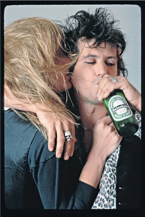  ?? ?? g Hard-wired for self-destructio­n: Keith Richards and his wife Patti Hansen; far left, Ozzy Osbourne in 1984, charged with ‘public intoxicati­on’
j 'Things were swerving out of control': music journalist Ian Winwood with Billie Joe Armstrong’s guitar in 2016