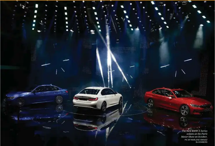  ?? PIC BY MARLENE AWAAD/ BLOOMBERG ?? The New BMW 3-Series sedans at the Paris Motor Show on October.