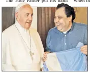  ??  ?? SOUL FOOD: Pope Francis congratula­tes Ismael Alba on the meal cooked for the pontiff.