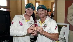  ?? PHOTO: GETTY IMAGES ?? Steve Smith and David Warner in happier times.