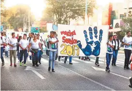  ?? FOTOS: NACHO REYES ?? Alrededor de 200 marcharon de Chapultepe­c al Centro tapatío