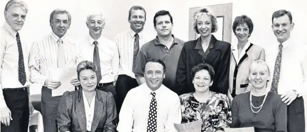  ??  ?? Advertiser days Ronnie Noble (third from left in back row) during his working days