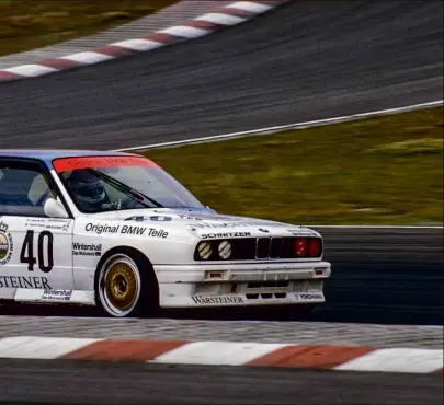  ??  ?? Left: E30 M3 dominated touring car racing in the 1980s. Below: 3.0 CSL at the Nürburgrin­g in ’73. Bottom: V12 LMR takes the chequered flag at Le Mans, 1999