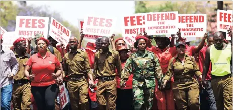  ?? Picture: MASI LOSI ?? OPPOSITION: EFF members picket outside the high court in Pretoria during President Jacob Zuma’s applicatio­n to interdict the public protector from releasing the state capture report.