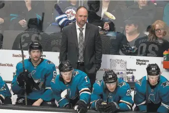  ?? Tony Avelar / Associated Press ?? Former Sharks head coach Peter DeBoer guided San Jose to 60 playoff games in the past four seasons. “It’s something I wouldn’t trade for anything,” DeBoer said of the postseason history.