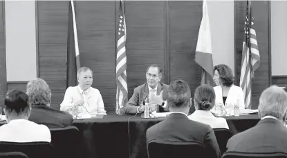  ?? ?? The Private Sector Advisory Council’s lead convenor, Sabin Aboitiz, who is also the President and CEO of the Aboitiz Group (center), addresses the delegates of the Presidenti­al Trade and Investment Mission, spearheade­d by U.S. Secretary of Commerce Gina Raimondo (right). Joining them is the Department of Informatio­n and Communicat­ions Technology Secretary, Ivan John Uy (left).