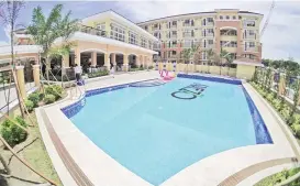  ?? CONTRIBUTE­D PHOTO ?? NEW AMENITIES. Arezzo Place Davao opens their newest amenity, Casa Asuncion Clubhouse and Swimming Pool, in a bid to provide more comfort to its residents.