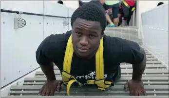  ?? Picture: BONGANI MBATHA ?? Double amputee Ranetsie Manyoni, 16, mounted the 550 steps of the arch at the Moses Mabhida Stadium to raise funds and awareness for amputee children.