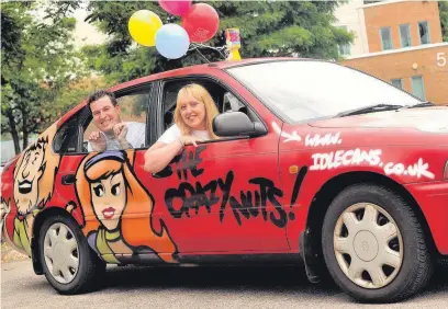  ?? CHRIS WHITEOAK
AN144257_04 ?? Sonia Graham and Keith Travers in their K-reg Toyota Carolla which completed the Monte Carlo or Bust Rally and raised money for Naomi House in Basingstok­e.