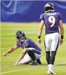  ?? GAIL BURTON/AP ?? In addition to punting for the Ravens, veteran Sam Koch continues to also be the holder for place-kicker Justin Tucker.