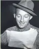  ?? JOURNAL SENTINEL FILES ?? Bing Crosby reads a radio script in 1956.