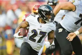  ?? NICK WASS/AP 2021 ?? Ravens running J.K. Dobbins is among six players placed on the physically-unable-to-perform list ahead of training camp.