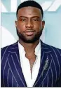  ??  ?? Sinqua Walls attends BET’s “American Soul” Los Angeles premiere on Feb. 4. Walls plays “Soul Train” host and mastermind Don Cornelius.