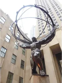  ??  ?? ATLAS, the bronze statue in front of Rockefelle­r Center.