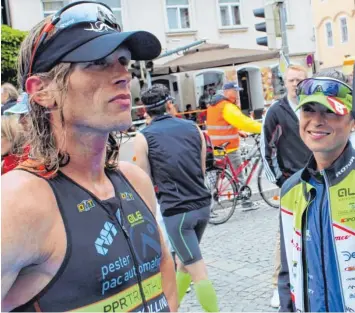  ?? Fotos: Gusbeth ?? In Lauingen bei der „Bayerische­n“auf der Strecke: das schwäbisch-schweizeri­sche Triathlon-Traumpaar Christian Brader und Petra Janeckova.