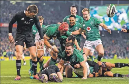  ??  ?? Over the line: Ireland’s Jacob Stockdale scored his side’s first try during their match New Zealand last year. The Shamrocks won 16-9 and will be aiming to emulate this feat on Saturday. Photo: Ramsey Cardy/getty Images