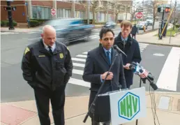  ?? ?? Sandeep Aysola, director of the New Haven Department of Transporta­tion, Traffic and Parking, talks about one of the red-light cameras proposed for the intersecti­on of South Frontage Road and Park Street.