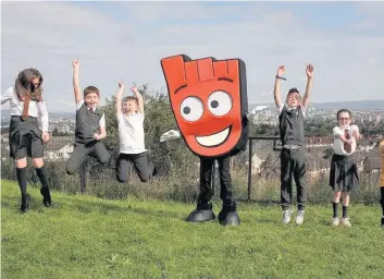  ??  ?? Jump for joy Pupils at Castleton were delighted to meet Strider the mascot