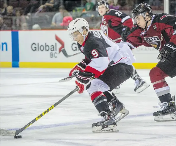  ?? RIC ERNST/PNG FILES ?? Brad Morrison, left, then of the Prince George Cougars, is chased by Vancouver Giants’ Jakob Stukel in an October 2015 regular-season game. Morrison now joins the Giants, who sent a conditiona­l second-round pick in the 2018 WHL bantam draft to the...