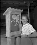  ?? ASSOCIATED PRESS FILE ?? Walt Disney, creator of Mickey Mouse, poses at the Pancoast Hotel on Aug. 13, 1941, in Miami.