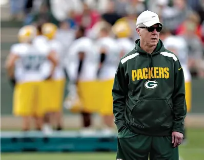  ?? AP Photo/Morry Gash, File ?? ■ In this July 27, 2013, file photo, Green Bay Packers general manager Ted Thompson watches during NFL football training camp in Green Bay, Wis. Thompson, whose 13-year run as Green Bay Packers general manager included their 2010 Super Bowl championsh­ip season, died Jan. 20, the team announced Jan. 21. He was 68. Thompson was Packers general manager from 2005-17 and drafted many notable players on the current roster, including two-time MVP quarterbac­k Aaron Rodgers.