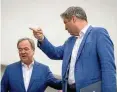  ?? FOTO: DPA ?? Aus Konkurrent­en werden gemeinsame Wahlkämpfe­r: Armin Laschet und Markus Söder.