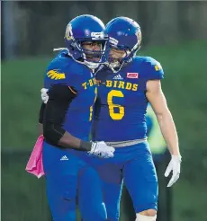  ?? RICH LAM/UBC ATHLETICS ?? Receiver Will Watson, right, says he’s relieved that he was drafted Thursday. He was chosen 54th overall by the Lions.