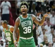  ?? LYNNE SLADKY — THE ASSOCIATED PRESS ?? Boston Celtics guard Marcus Smart (36) gestures during the first half of Game 2of the NBA Eastern Conference finals playoff series against the Miami Heat on Thursday in Miami.