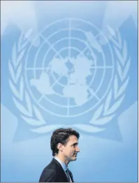  ?? CP PHOTO ?? Prime Minister Justin Trudeau leaves the stage after addressing delegates during the 2017 United Nations Peacekeepi­ng Defence Ministeria­l conference in Vancouver, B.C., Wednesday.